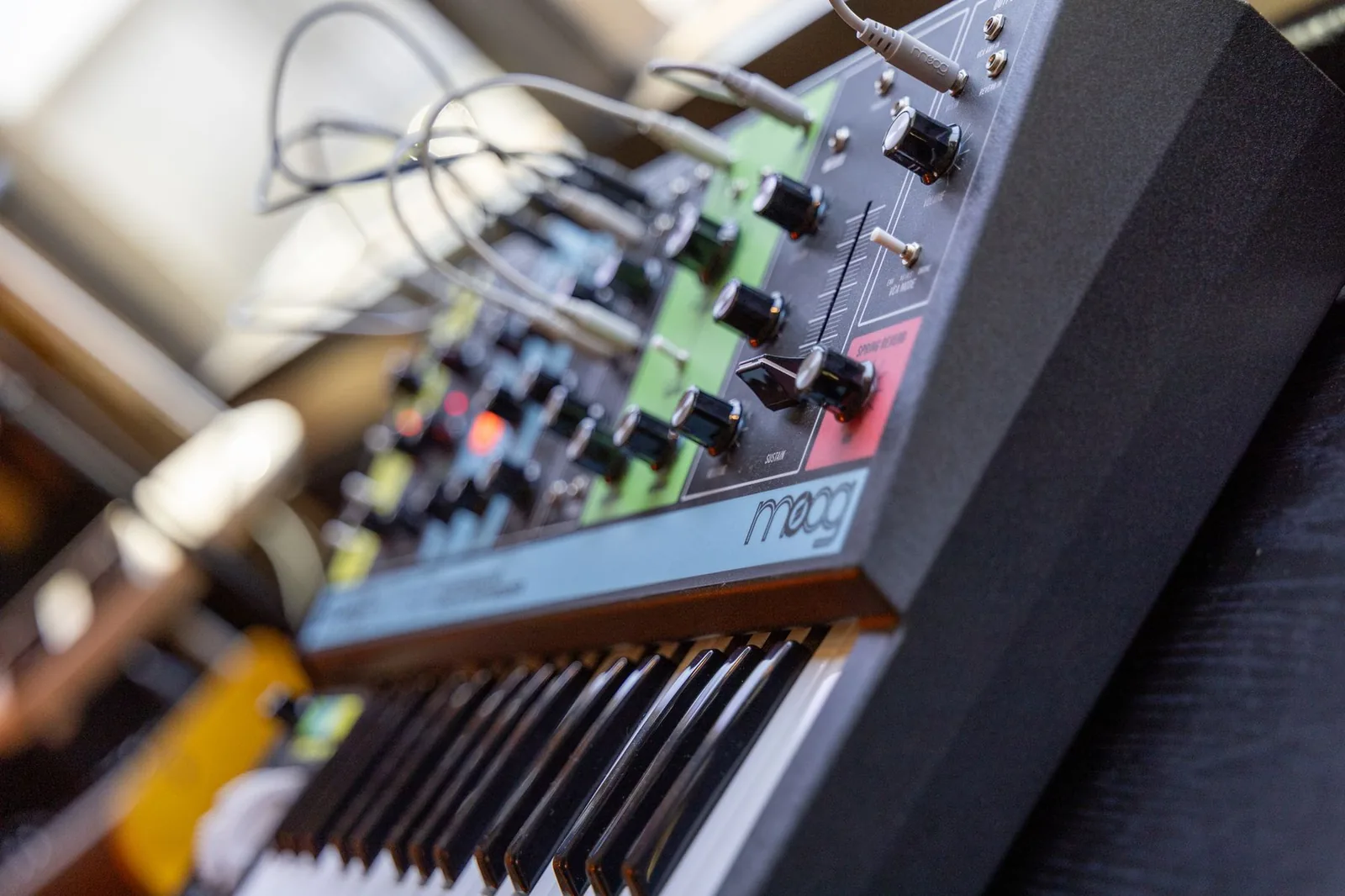 Photo: a Moog Grandmother semi-modular synthesizer with its patch bay