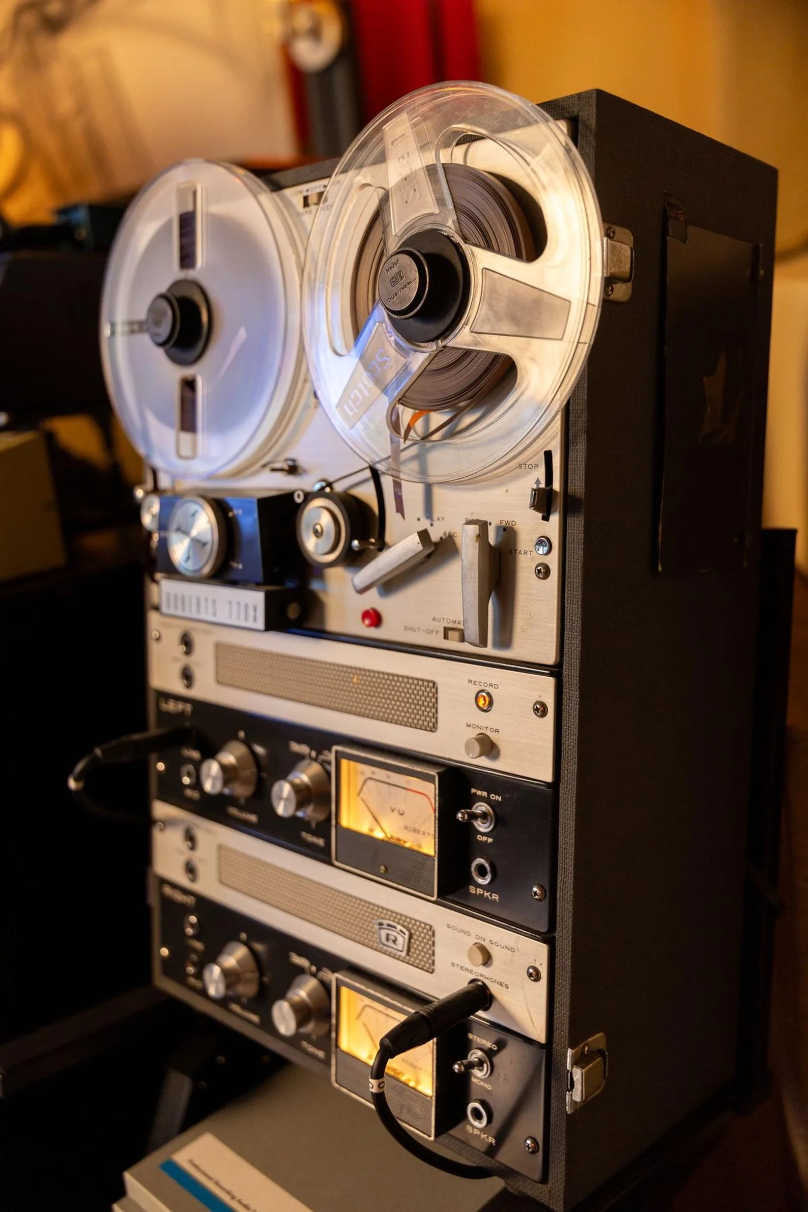 Photo: a reel-to-reel tape machine in the studio